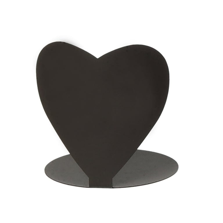 Sort metal bogstøtte formet som et hjerte med rund base.