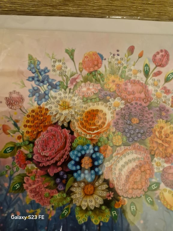 Her er der nogen rigtig pæne diamond korte med nogle pæne blomster på 