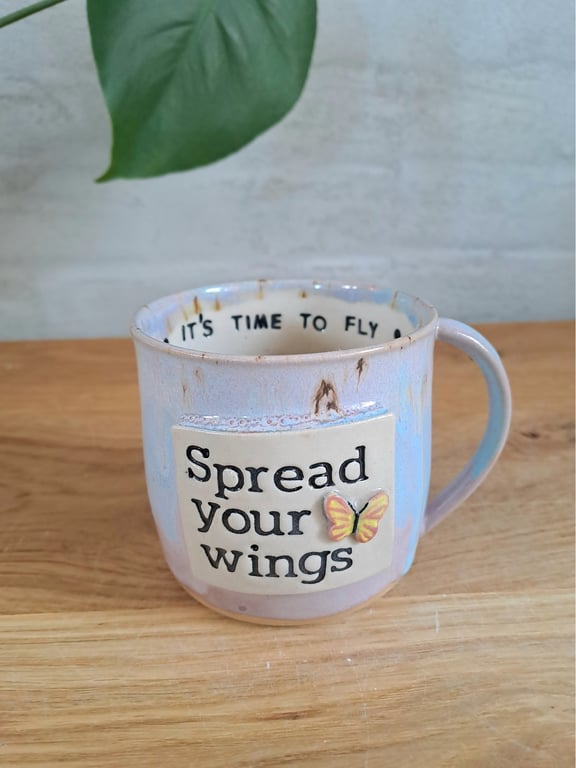 Sommerfugle koppen kan indeholde 325ml.