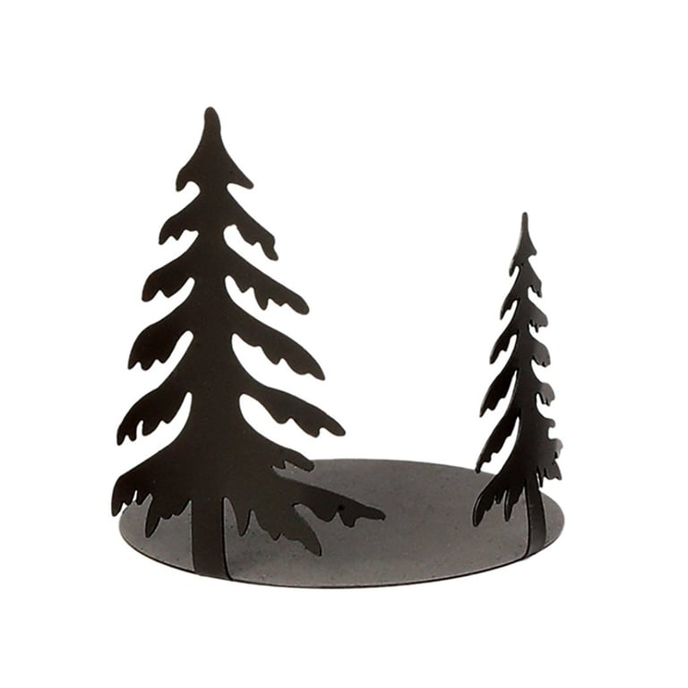 Metallisk skål med udskårne grantræer som dekoration.