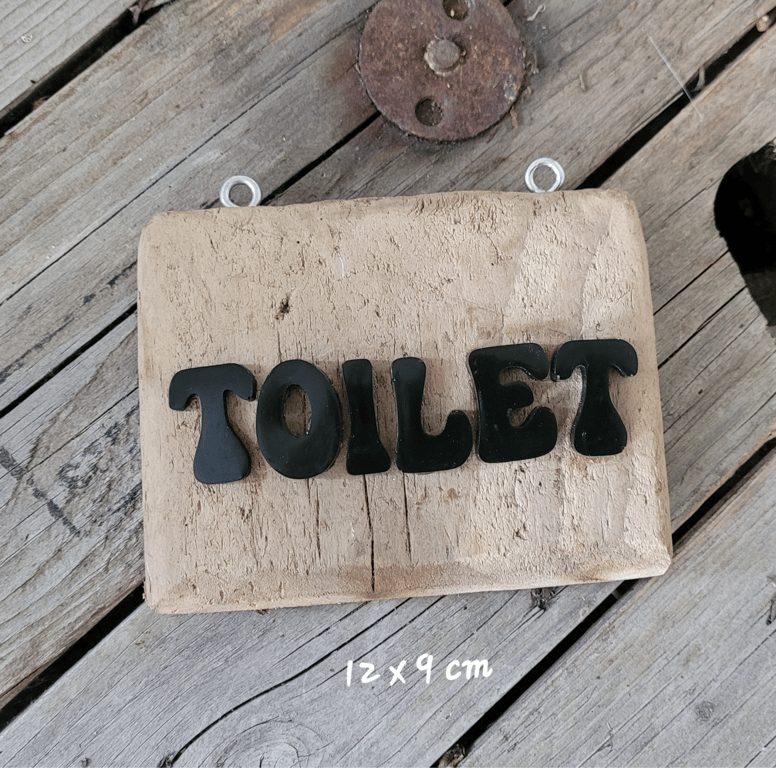 Drivtømmer skilt - toilet.