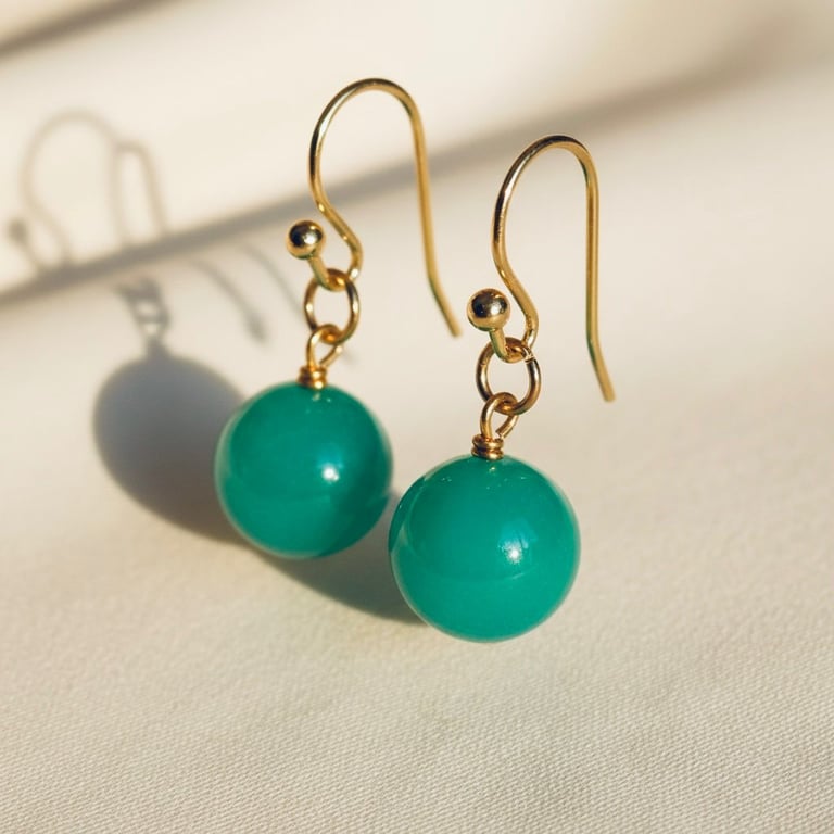 Øreringe med grønne jade kugler 