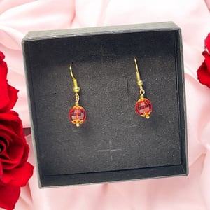 Røde øreringe  – produktbillede