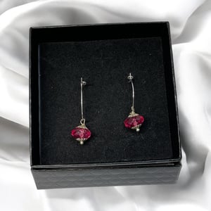 Lyserød øreringe  – produktbillede