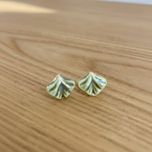 Grønne ørestikker – produktbillede